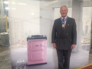 The High Sheriff standing next to the new AGA City60